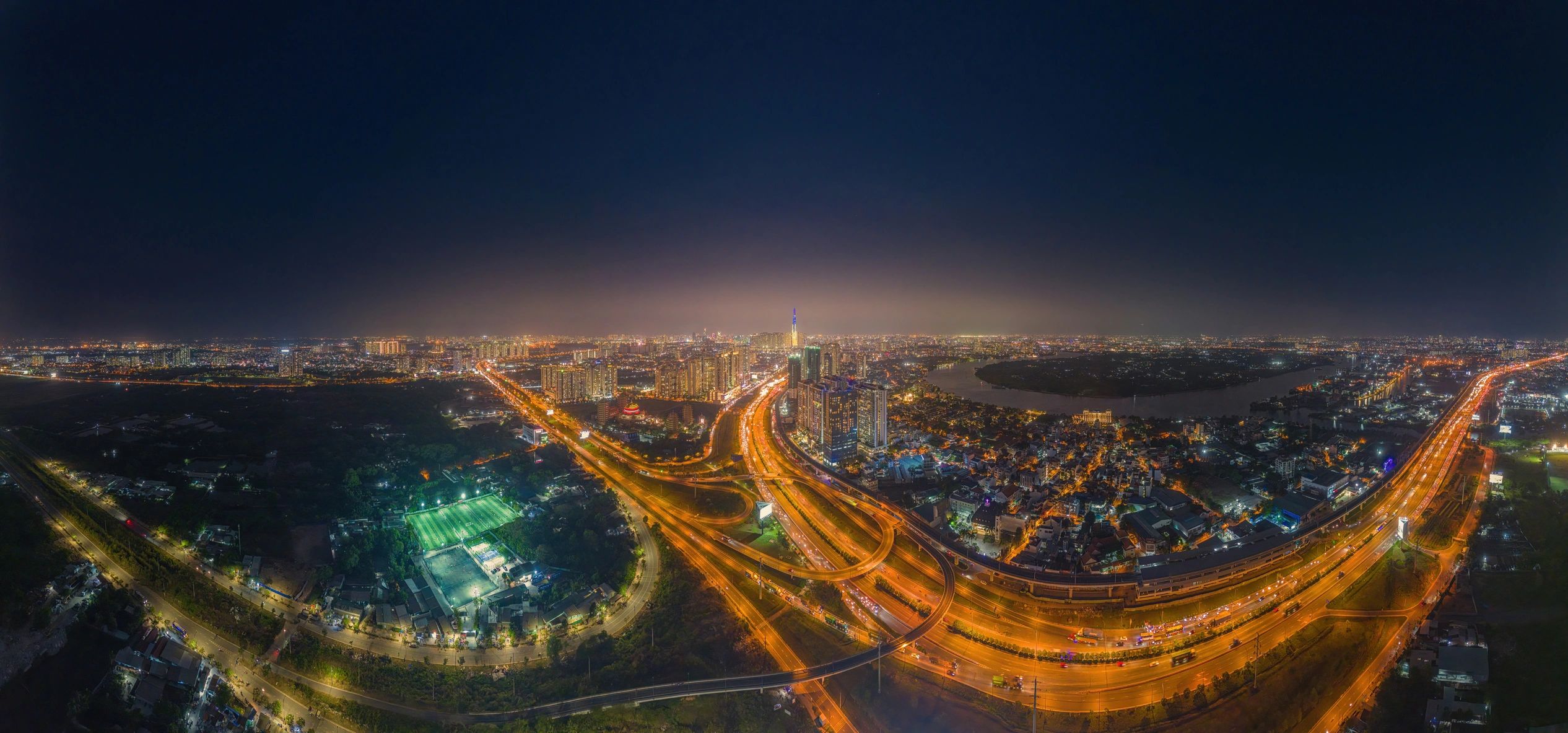 Panoramic city skyline and infrastructure at night